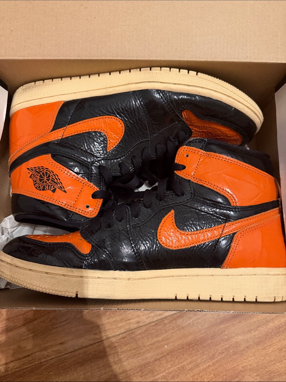 Jordan High-Top Sneaker in Black & Orange with Cream Midsole